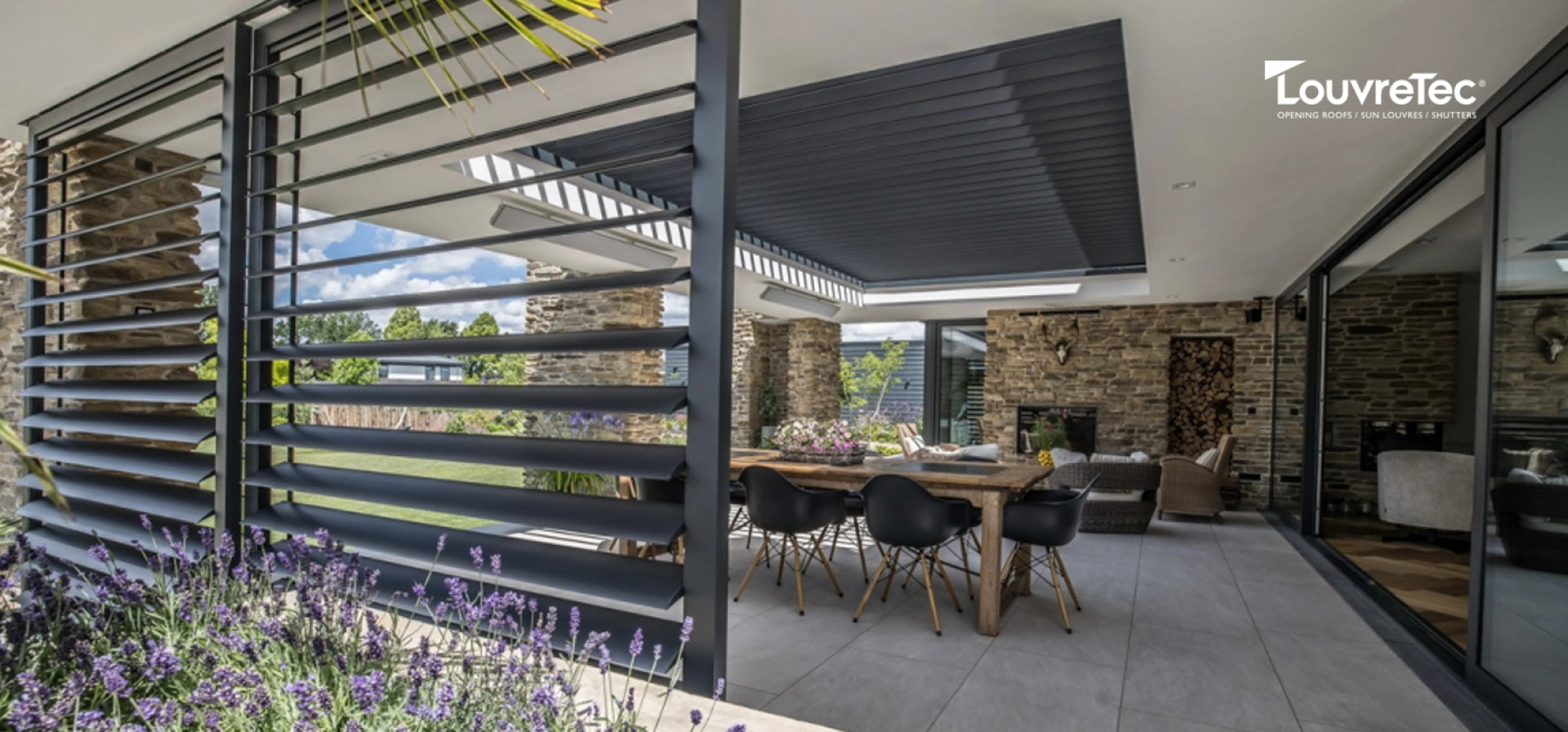 Covered patio with adjustable louvred roof and side screens, showing how louvred roofs provide shade, airflow control and weather protection for year round outdoor living.
