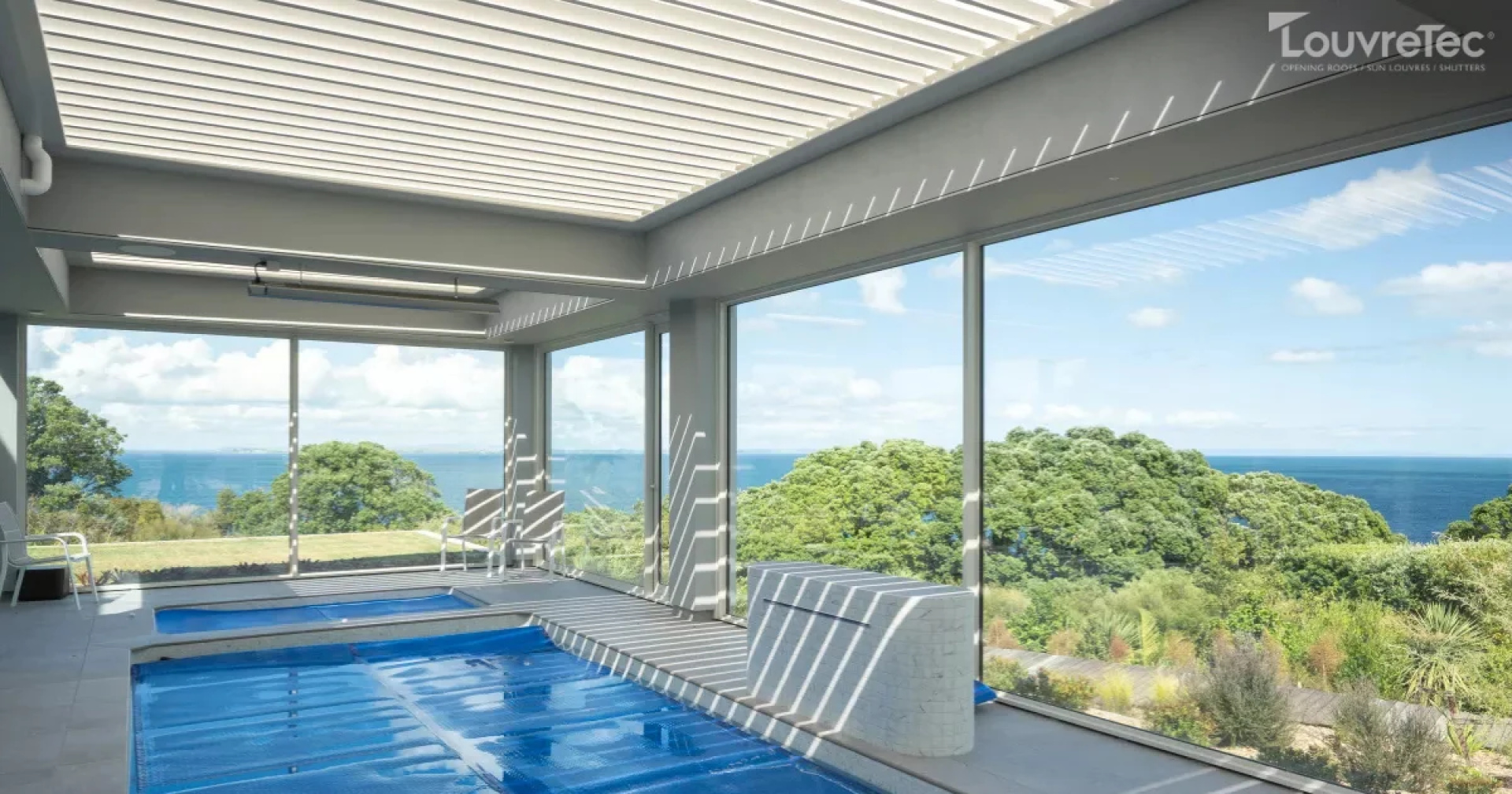 Modern residential building featuring a Louvretec opening roof and clean architectural lines.