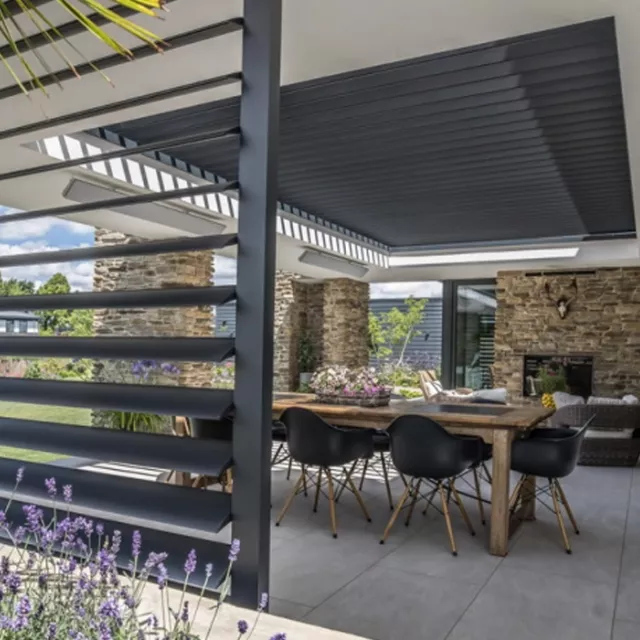 Covered patio with adjustable louvred roof and side screens, showing how louvred roofs provide shade, airflow control and weather protection for year round outdoor living.
