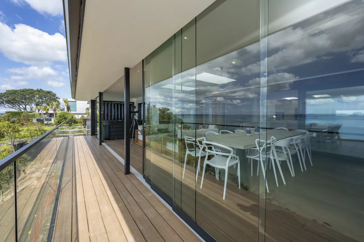 Slidetec Frameless Glass Sliding Doors. By Louvretec Auckland.
