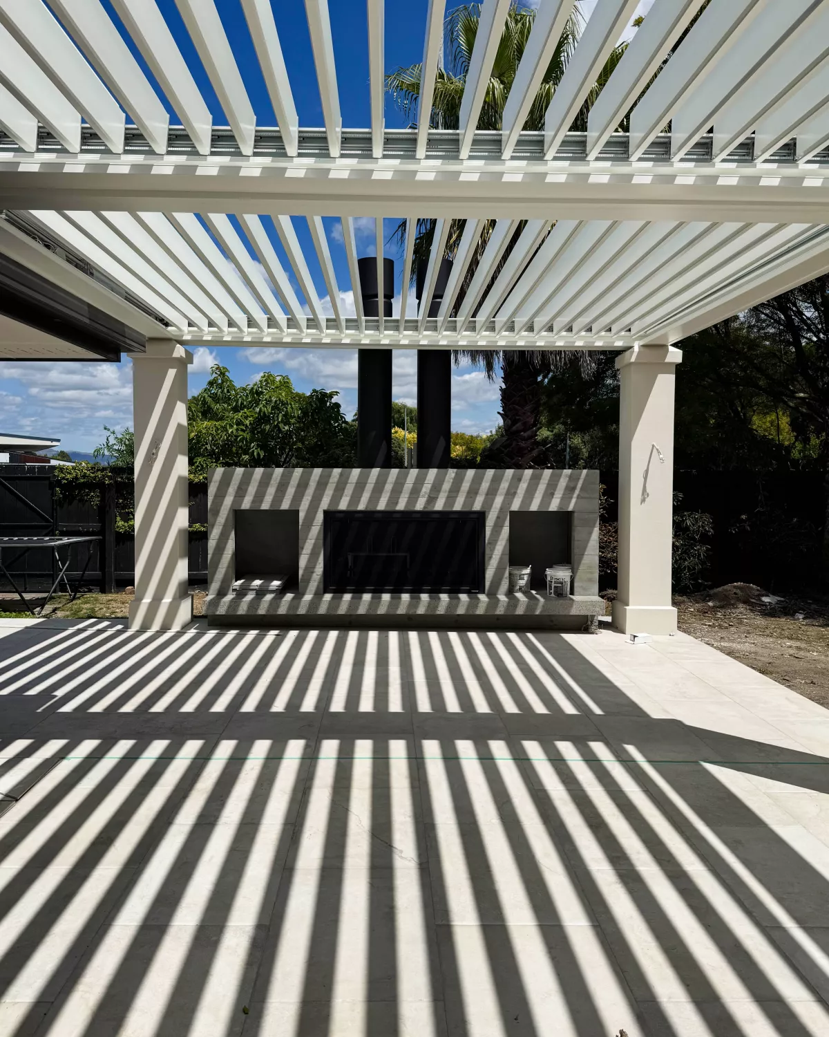 Welcomed shade. This beautiful outdoor room by Louvretec Gisborne