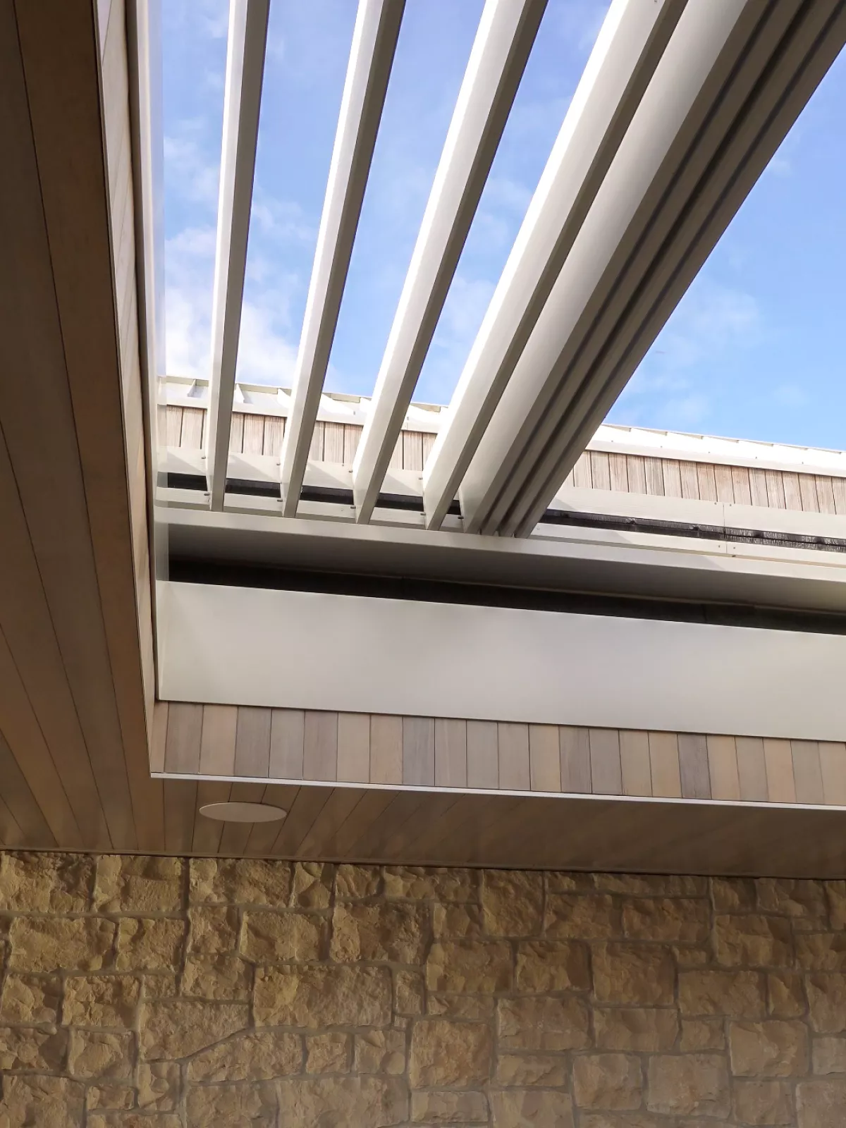 Retract Roof with Louvres retracting back.